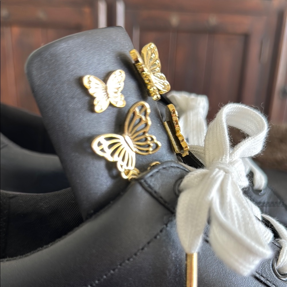 Michael Kors Black and Gold High-Top Sneakers - Picture 3 of 6